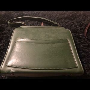 Vintage handbag from the 50s. Not as in good of shape as my other one. Needs TLC